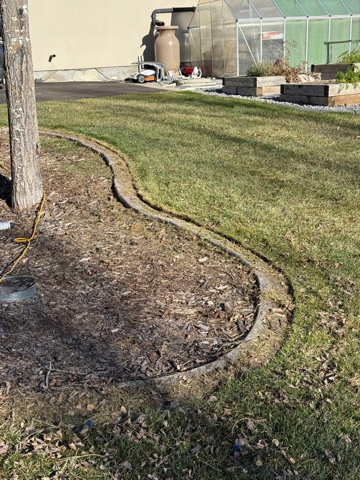 Defined lawn edge alongside a garden bed
